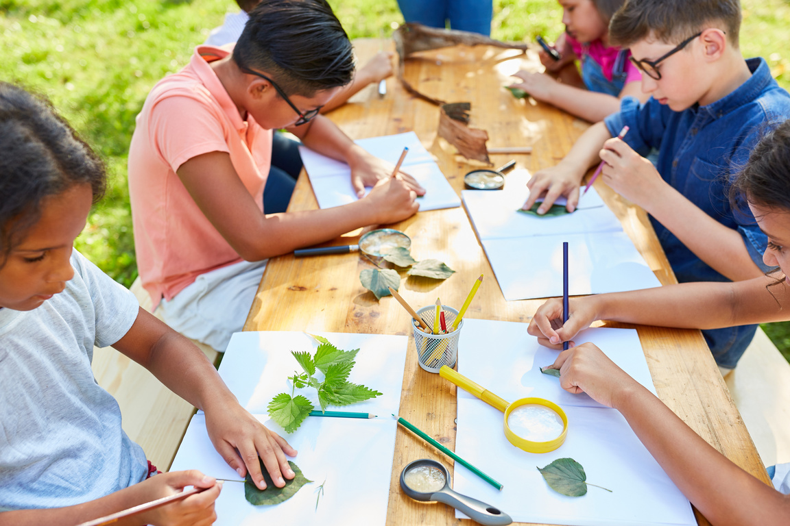 Children Draw and Do Handicrafts Together at Summer Camp